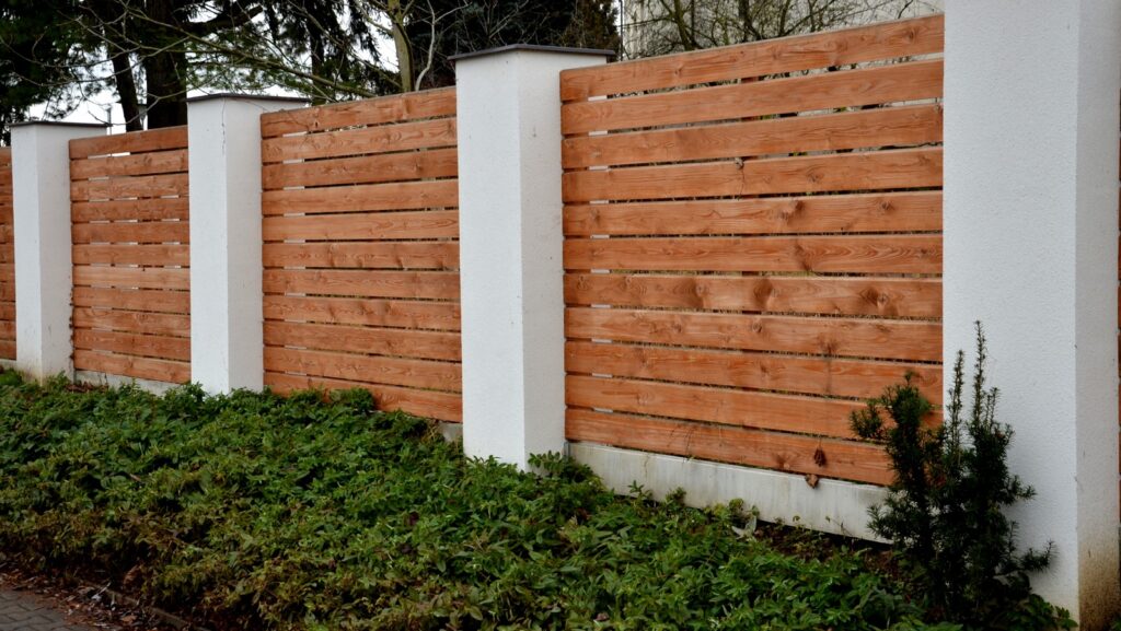 Wooden,Fence,Made,Of,Natural,Planks.,The,Columns,Are,Made